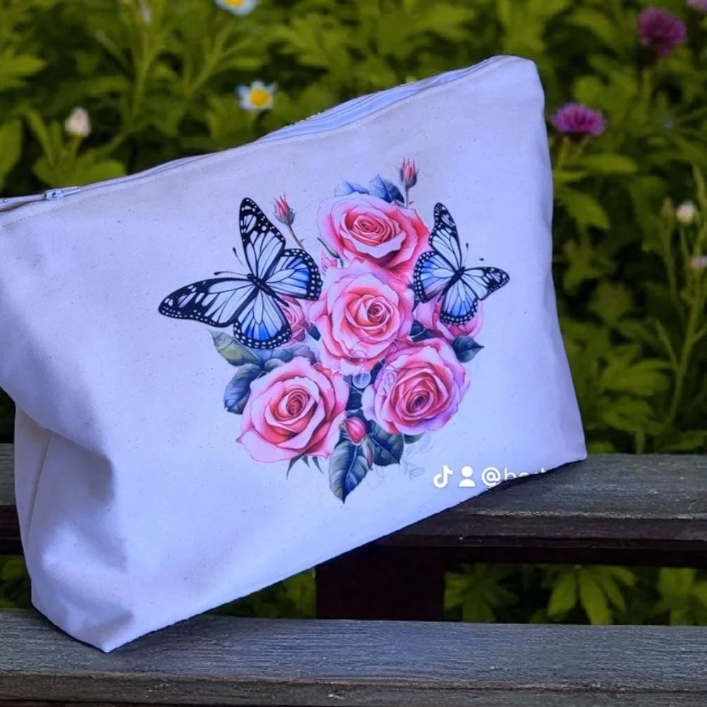 Chic White Cosmetic Bag with Floral and Butterfly Design